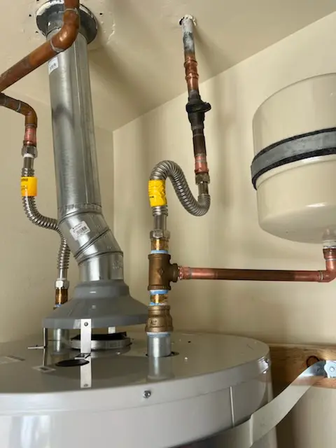 Water heater installation and plumbing repair in Millis